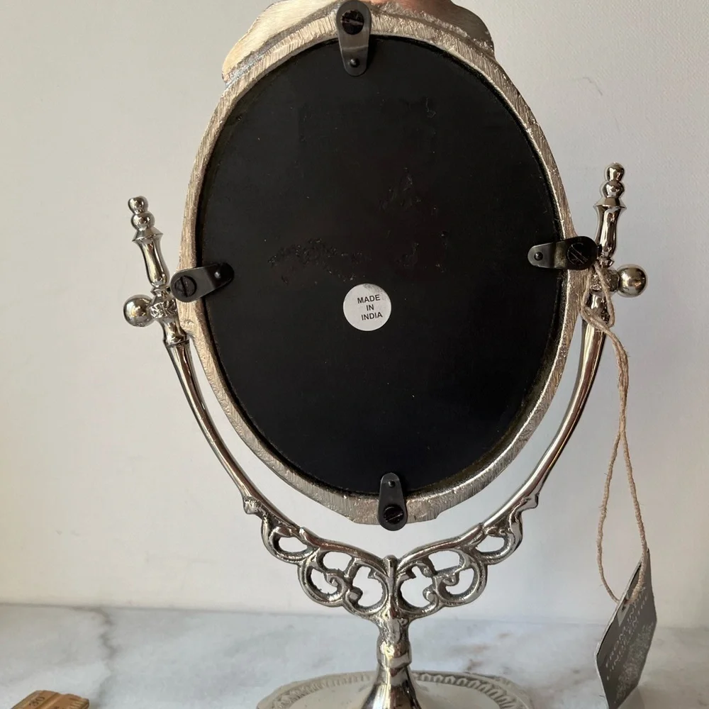Silver tone metal antique style vanity mirror adjustable free standing 10” high